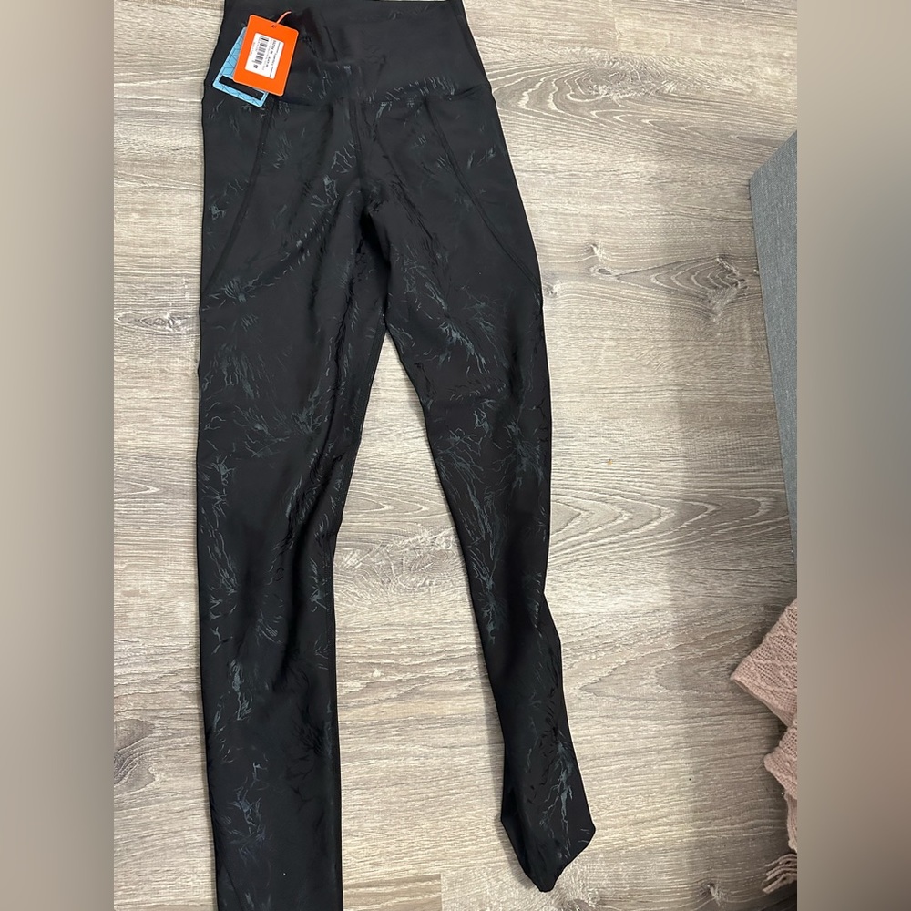 Women’s Superstacy Leggings in Medium, brand new, never worn